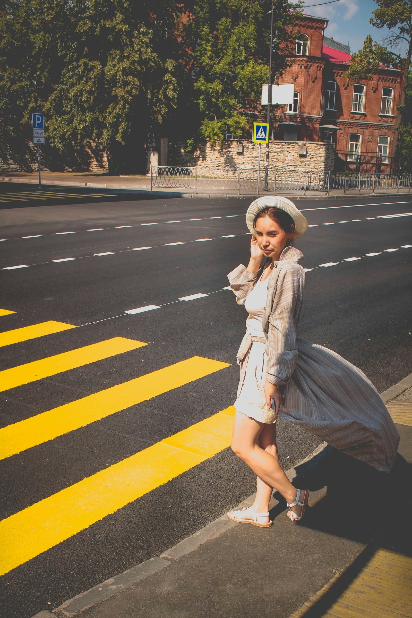 woman wearing brown dress